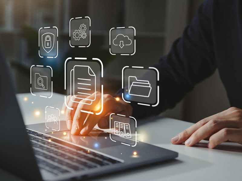 Digital document and security icons above a laptop